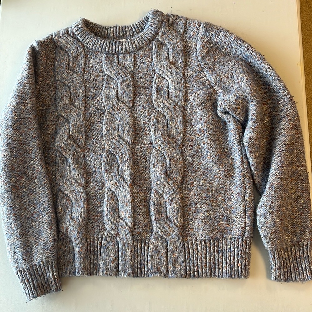 Light blue crew neck sweater. Large
